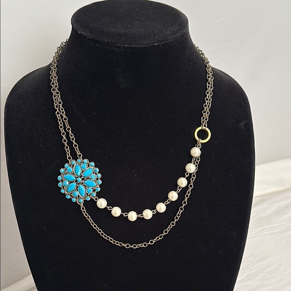Double strand necklace with turquoise color flower